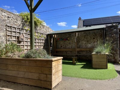 Sheltered area with planters